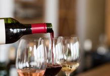 Pouring wine in glasses