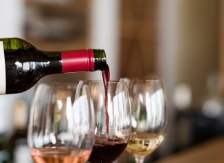 Pouring wine in glasses