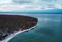 How Climate Change Is Impacting Michigan’s Wine Scene Lake Michigan insulates the Old Mission Peninsula in the winter,