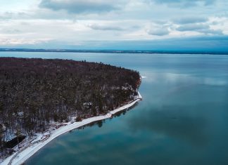 How Climate Change Is Impacting Michigan’s Wine Scene Lake Michigan insulates the Old Mission Peninsula in the winter,